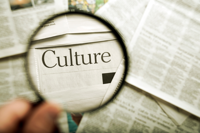 A magnifying glass highlights the word Culture.
